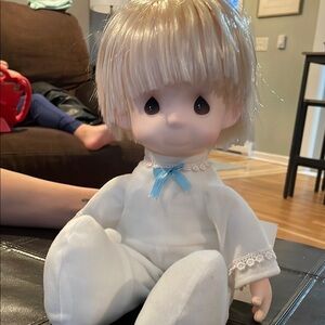 Adorable White Plush Doll with Blue Ribbon